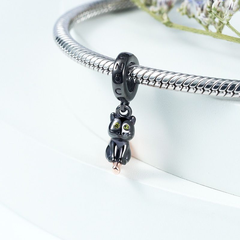 Cat Riding Broom Pendant