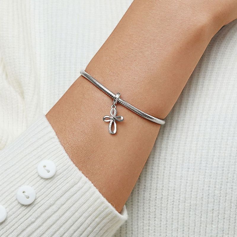 Eternal Ribbon Cross Pendant