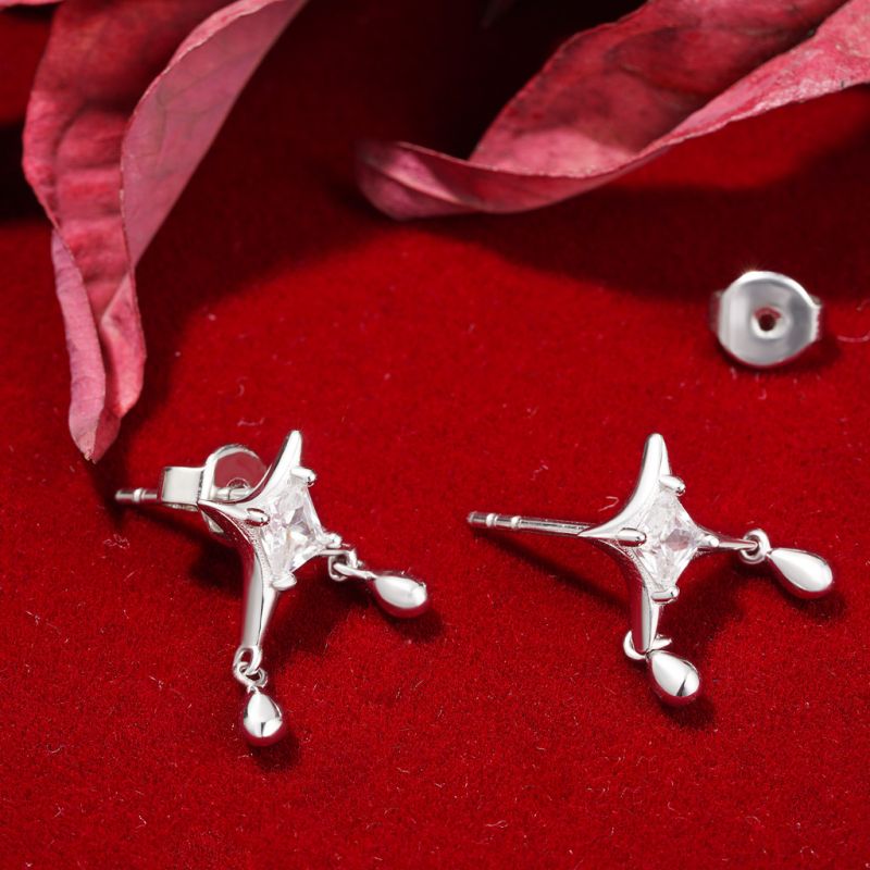 Cz Dripping Star Stud Earrings