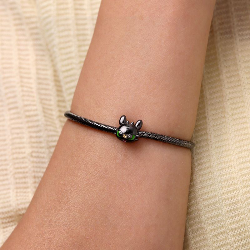 Impish Toothless Stopper Charm